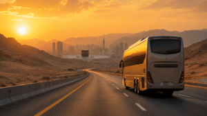 Umrah bus from Dubai to Makkah 2026, luxury coach on desert highway route